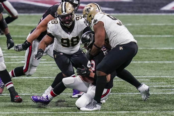 New Orleans Saints defensive tackle David Onyemata (93) tackles Atlanta quarterback Matt Ryan (2) in the backfield. Mandatory Credit: Dale Zanine-USA TODAY Sports